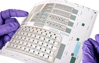 Printed transistors scale up to system prototypes